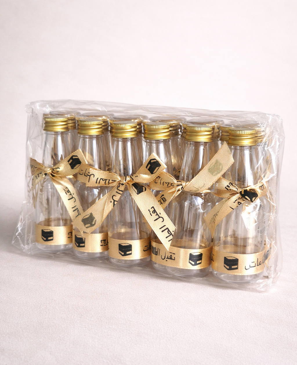 مجموعة 12 زجاجة ماء زمزم للهدايا – هدية العمرة والحج