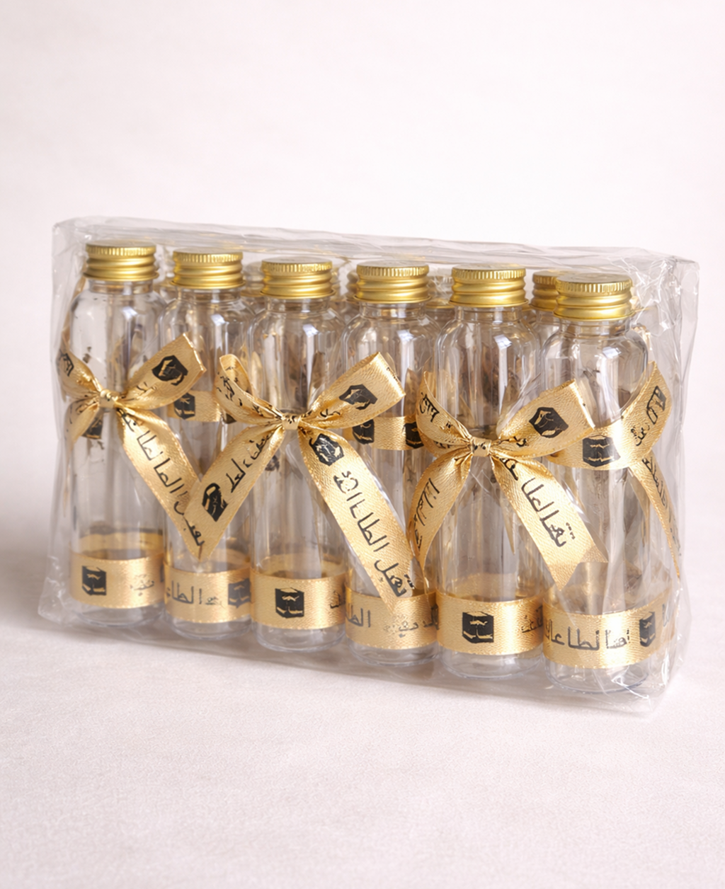 طقم 12 زجاجة ماء زمزم للهدايا – مناسبات العمرة والحج